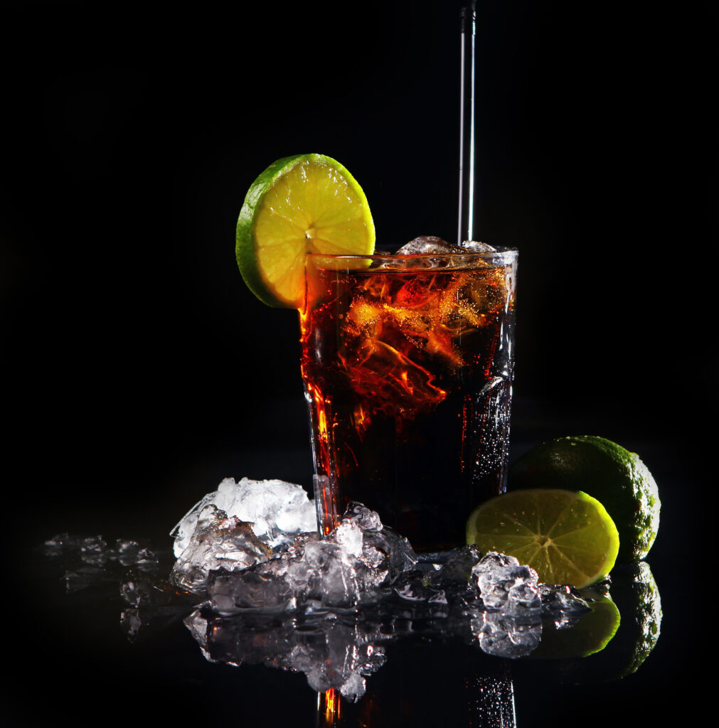 Fresh cola drink with green lime